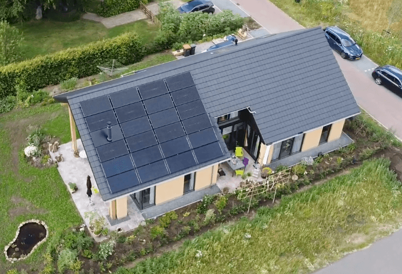 PVT-panels-Triple-Solar-roof-modern-home-Ommen-Tijhaar-drone-video-shingled-roof-thumbnail|Circular-gasless-home-sustainably-heated-with-Triple-Solar-PVT-panels-Nibe-heat-pump-01|PVT-panels-Triple-Solar-roof-modern-home-Ommen-Tijhaar-drone-video-shingled-roof-001|PVT-panels-Triple-Solar-roof-modern-home-Ommen-Tijhaar-drone-video-shingled-roof-0013|